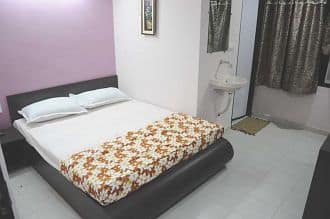 https://imgcld.yatra.com/ytimages/image/upload/t_hotel_yatra_city_desktop/v1464497210/Domestic Hotels/Hotels_Ahmedabad/Hotel AVN/HO_TOtokz.jpg